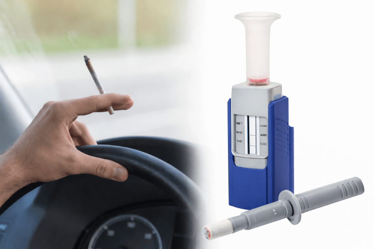 Main sur le volant d'une voiture, fumant un joint, avec un appareil de test à côté.